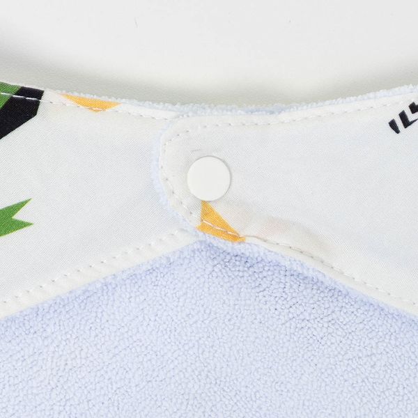 kit-2-babadores-impermeaveis-confetes-pastel-dinossauro-